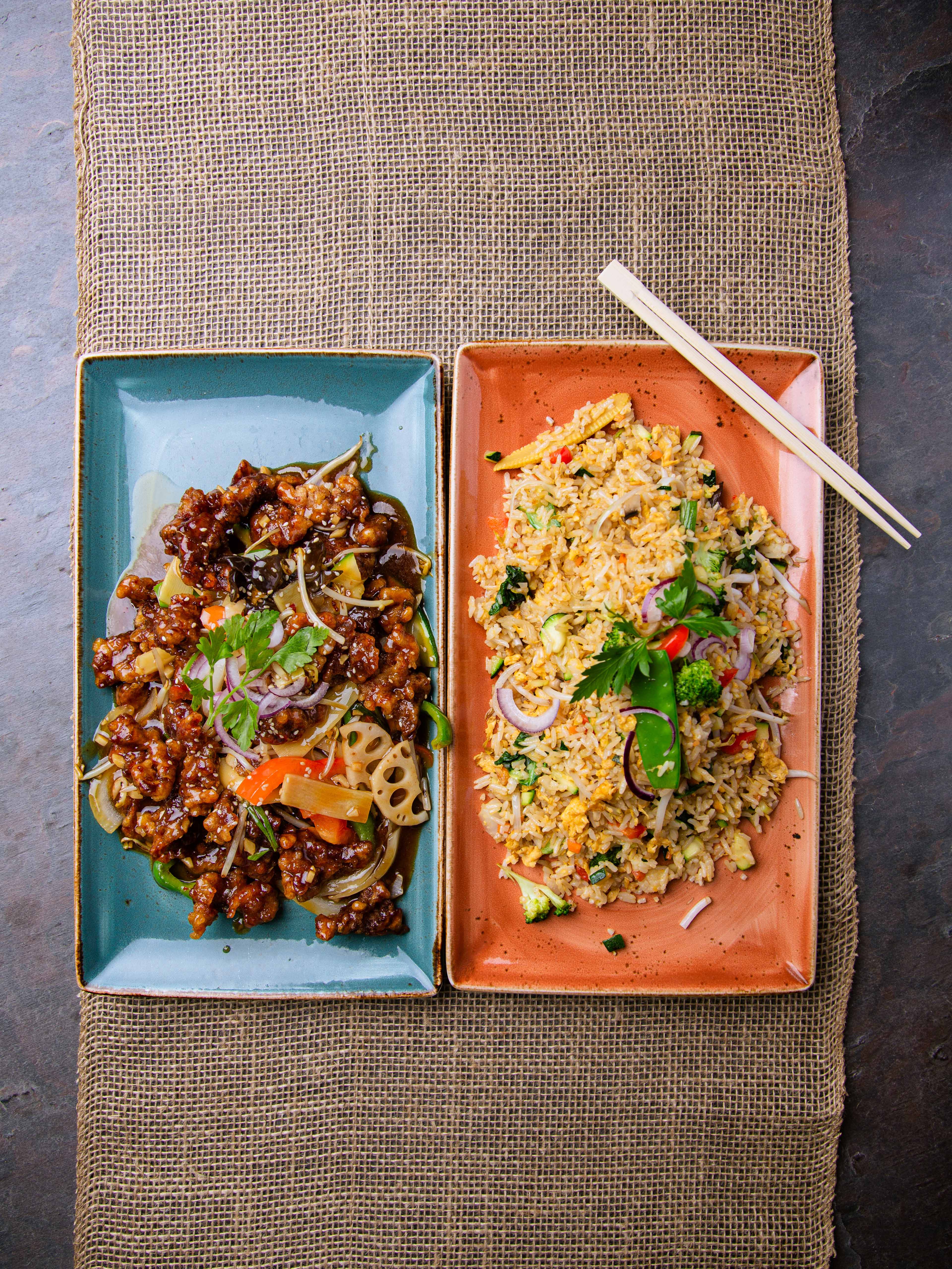 Deep fried beef with vegetables and fried egg rice with vegetables